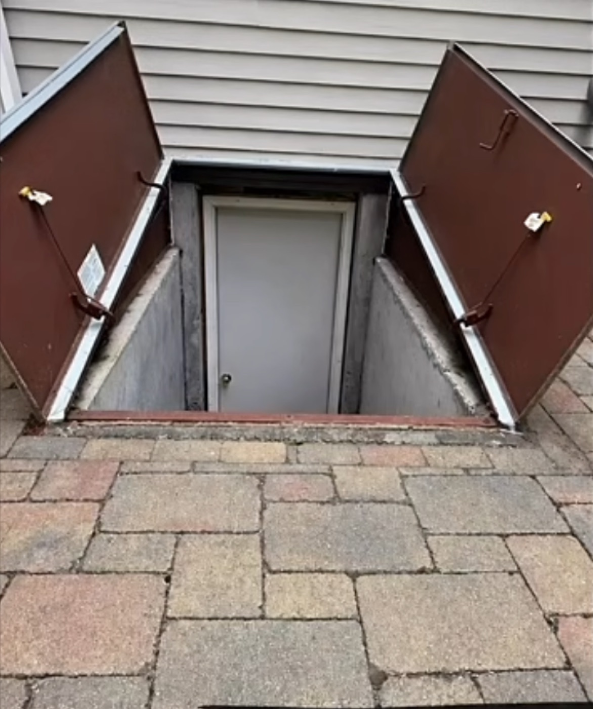 Before: old metal bulkhead doors
